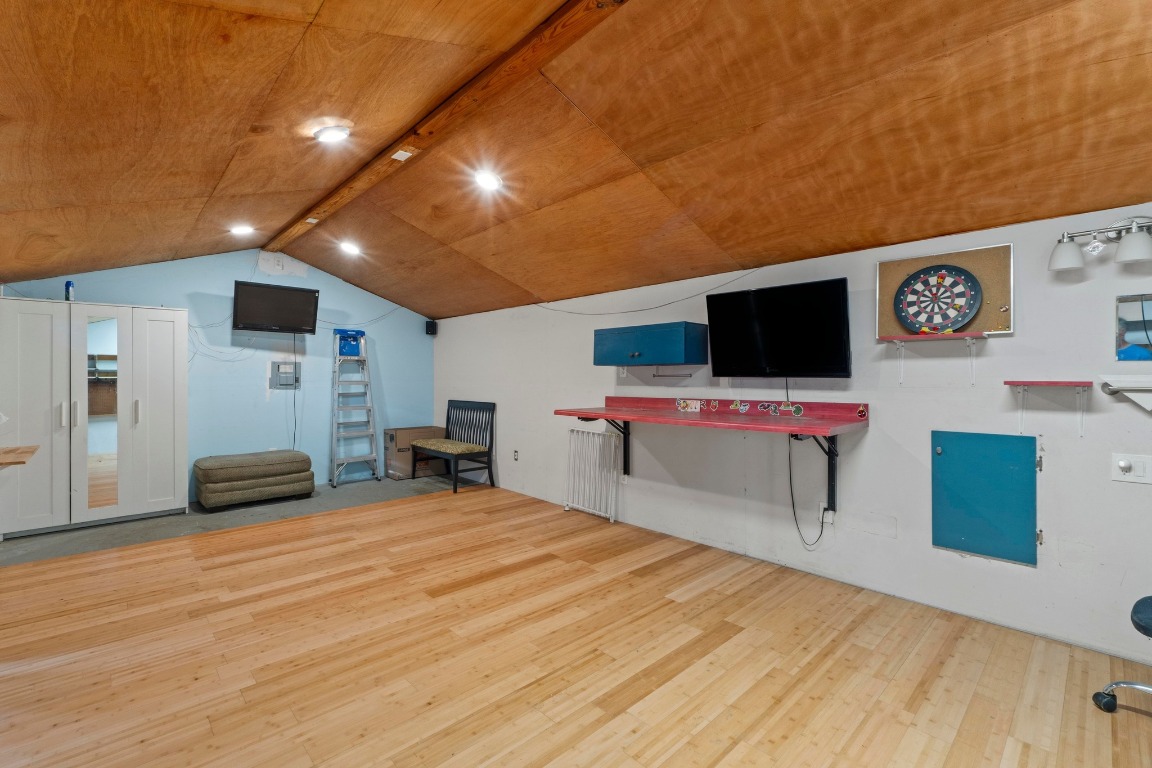 1805 Vine Street Georgetown, TX 78626 - Photo 25 of 32 a room with furniture and a flat screen tv