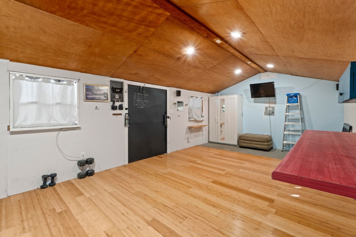 1805 Vine Street Georgetown, TX 78626 - Photo 26 of 32 a bed room with a bed and cabinets