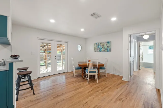 a view of a livingroom with furniture and a window