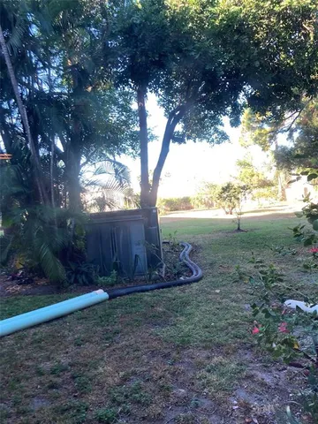 a view of a room that has a window in it