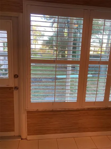 an empty room with window