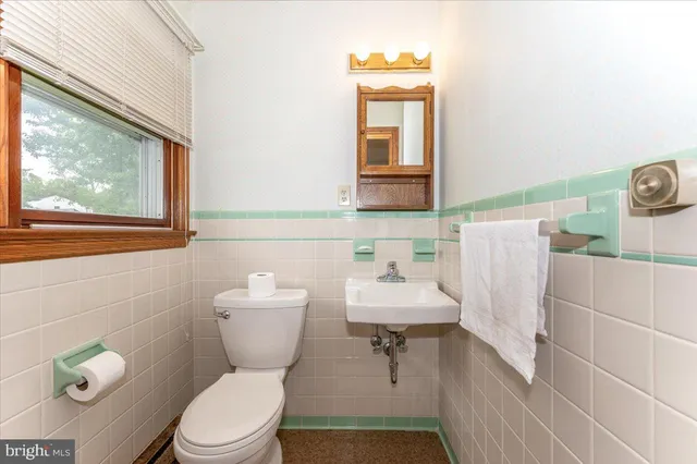 a room with a bed and a window