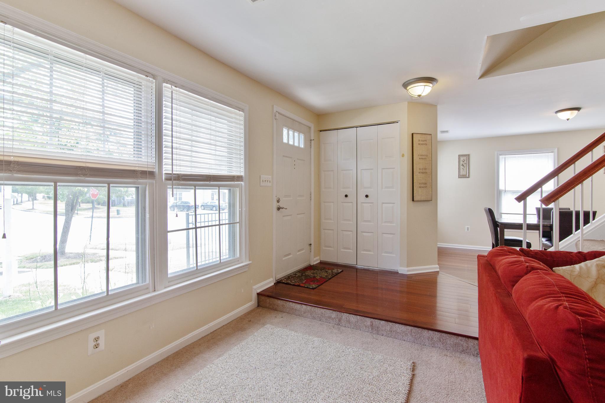 9304 Palmer Place, Unit 5 Laurel, MD 20708 - Photo 4 of 30 a spacious bedroom with a bed and a large window