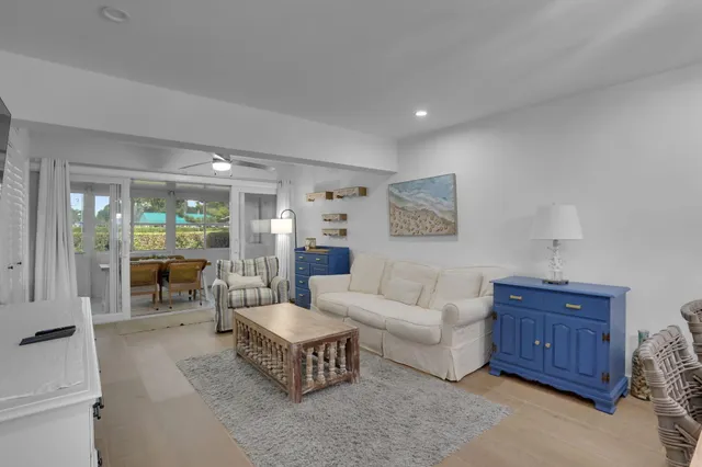 a living room with furniture and a area