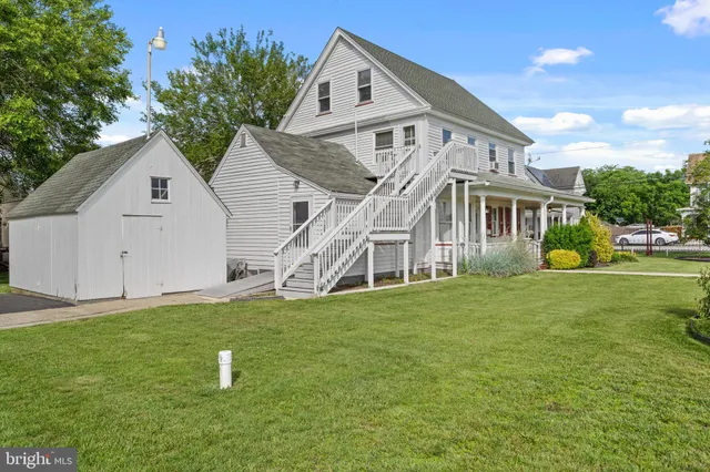 a backyard of a house with seating space