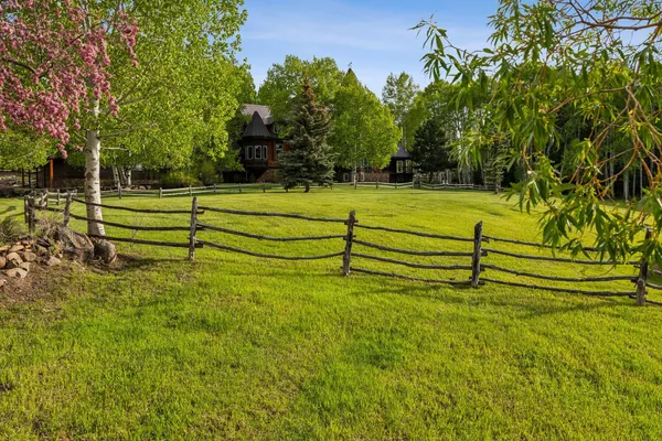 a view of a lake with a yard