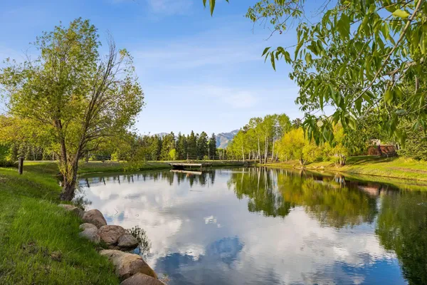 a view of an ocean with a mountain