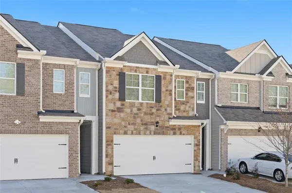 a view of a house with a sink and dishwasher