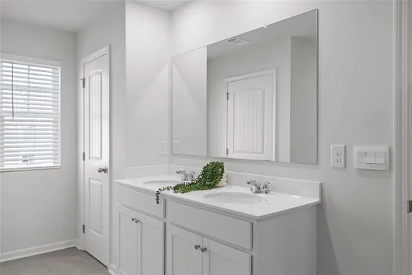 a bathroom with a sink and a vanity