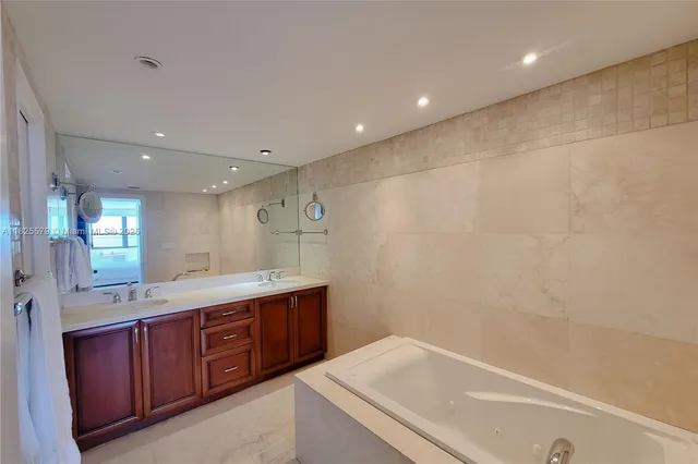 a lobby with furniture and a large window