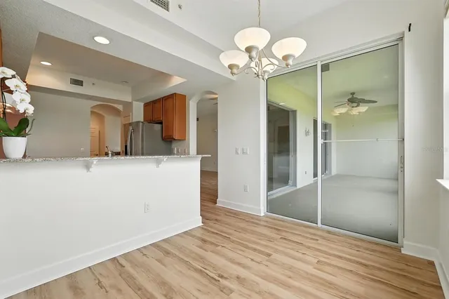 a view of a back yard from a balcony