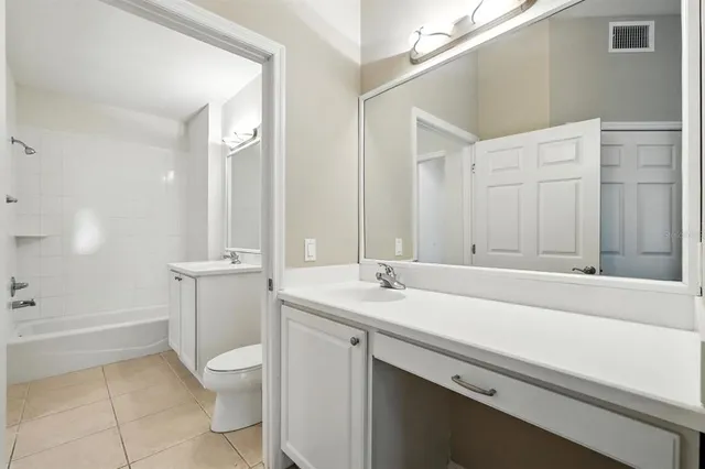 a view of a lake with a big yard