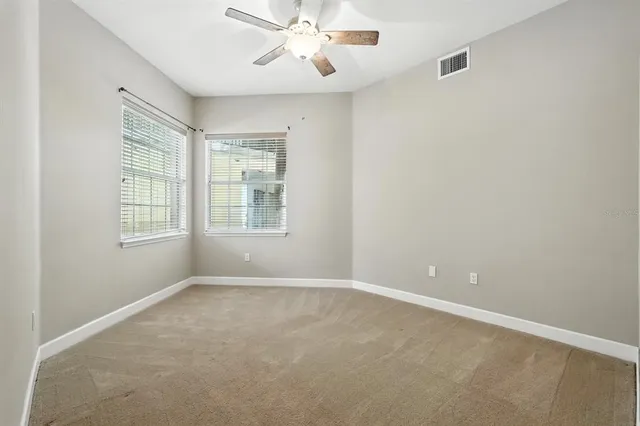 an aerial view of a house with yard swimming pool and outdoor seating