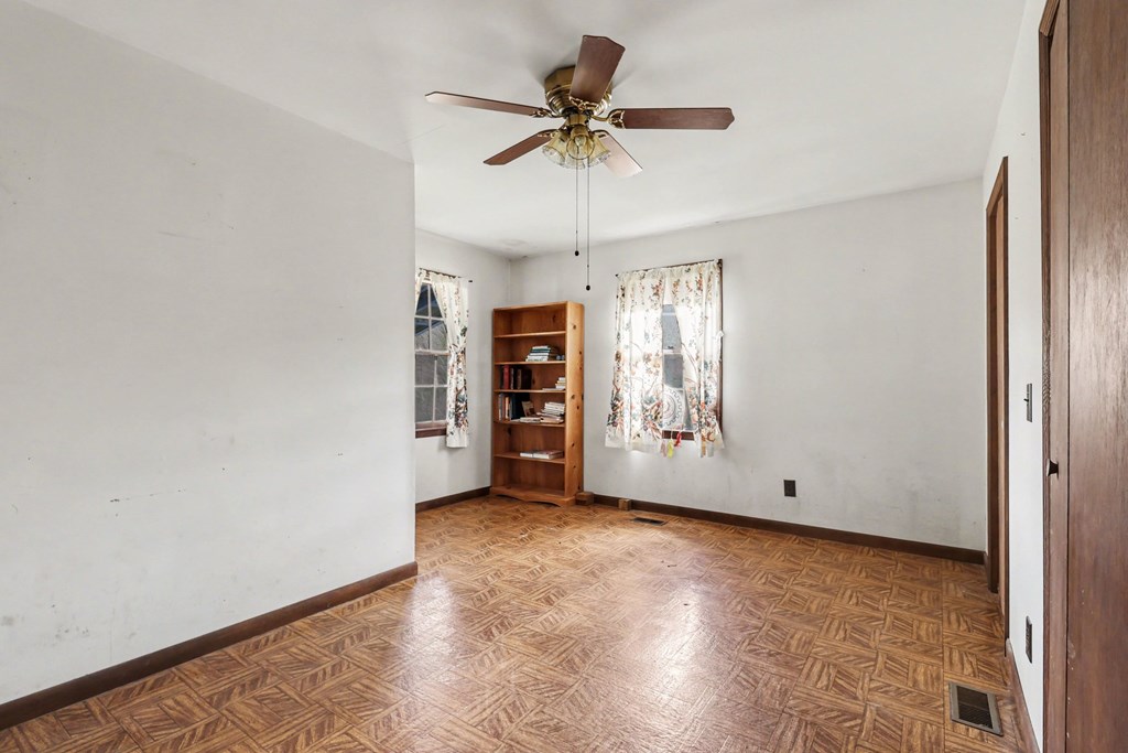 595 Wildlife Trail Morganton, GA 30560 - Photo 11 of 34 an empty room with closet and windows