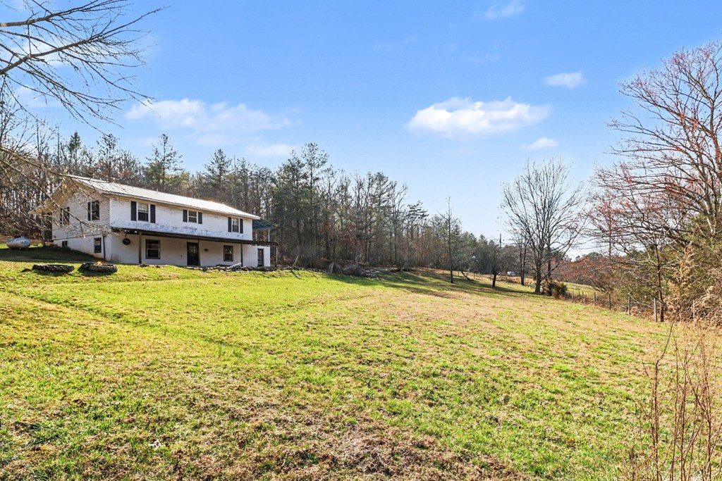595 Wildlife Trail Morganton, GA 30560 - Photo 24 of 34 a view of a swimming pool with an outdoor space and seating area