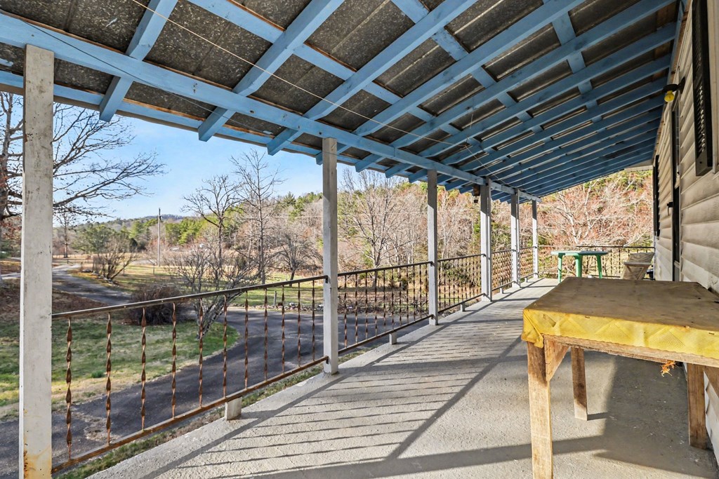 595 Wildlife Trail Morganton, GA 30560 - Photo 28 of 34 a view of a swimming pool with a patio