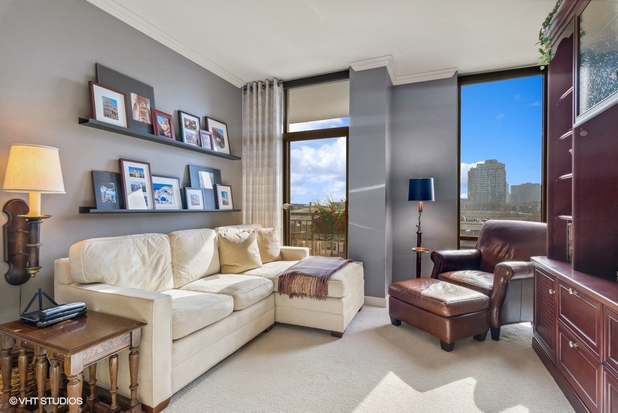 1335 South Prairie Avenue, Unit 605 Chicago, IL 60605 - Photo 13 of 20 a living room with furniture and a large window