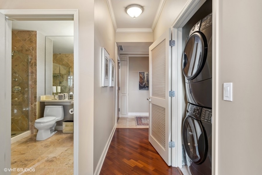 1335 South Prairie Avenue, Unit 605 Chicago, IL 60605 - Photo 16 of 20 a view of a bathroom with a washer and dryer