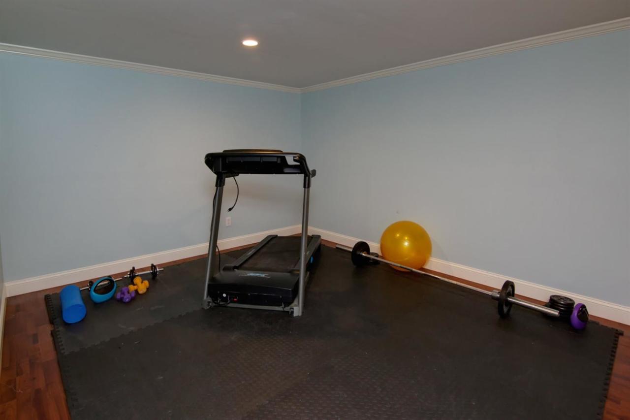 7 Webquish Lane Mashpee, MA 02649 - Photo 20 of 28 a view of a room with gym equipment