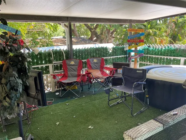 a view of a two chairs in patio