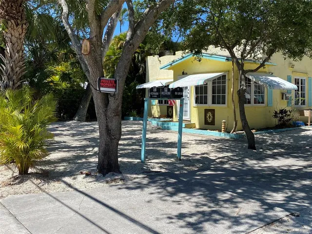 a front view of a house with street