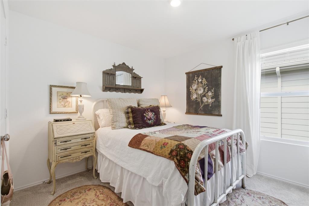 5969 Sumlin Way Princeton, TX 75407 - Photo 15 of 26 a bedroom with a bed and a window