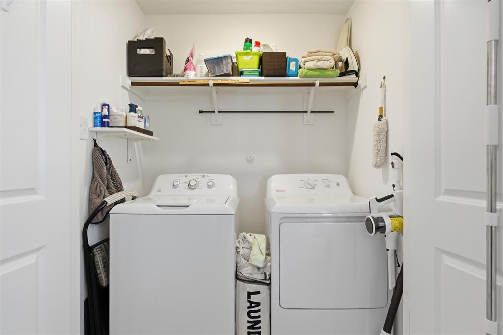 5969 Sumlin Way Princeton, TX 75407 - Photo 19 of 26 a utility room with dryer and washer