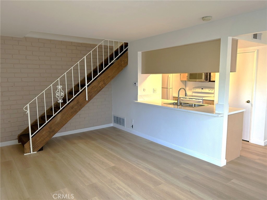 2053 North Avenida Refugio, Unit 2 Simi Valley, CA 93063 - Photo 4 of 26 Living Room/Stairs