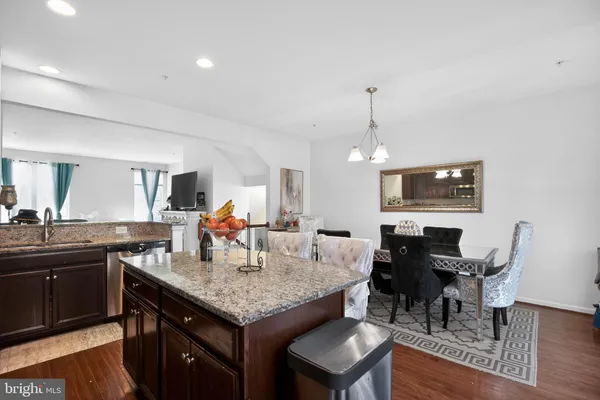 a view of dining table and chairs