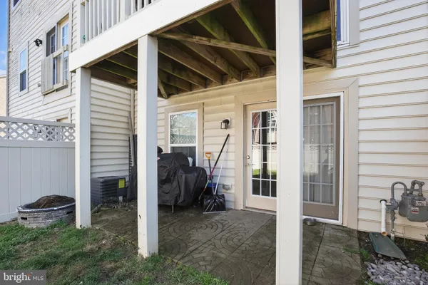 a view of a porch with seating space