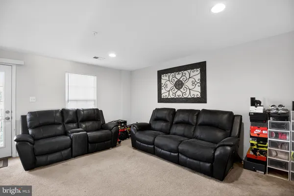 a living room with furniture and a couch