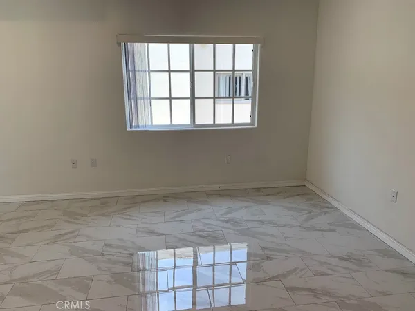 a view of a room that has a window in it