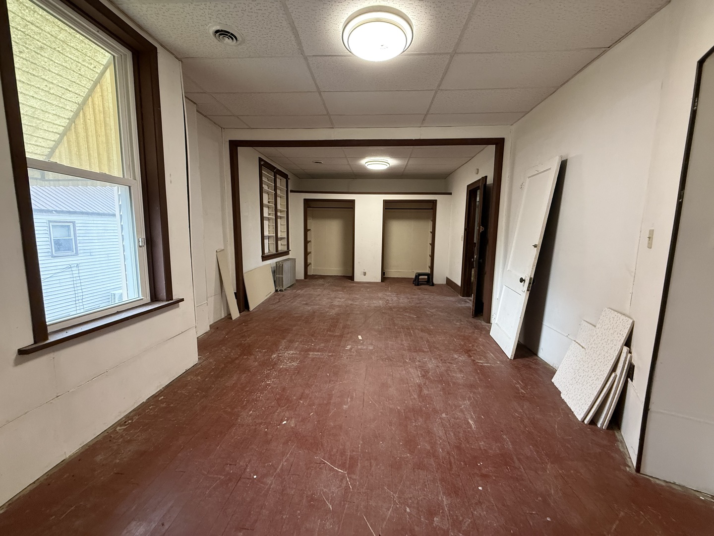 123 West St Paul Street Spring Valley, IL 61362 - Photo 15 of 28 a view of a hallway with furniture and wooden floor