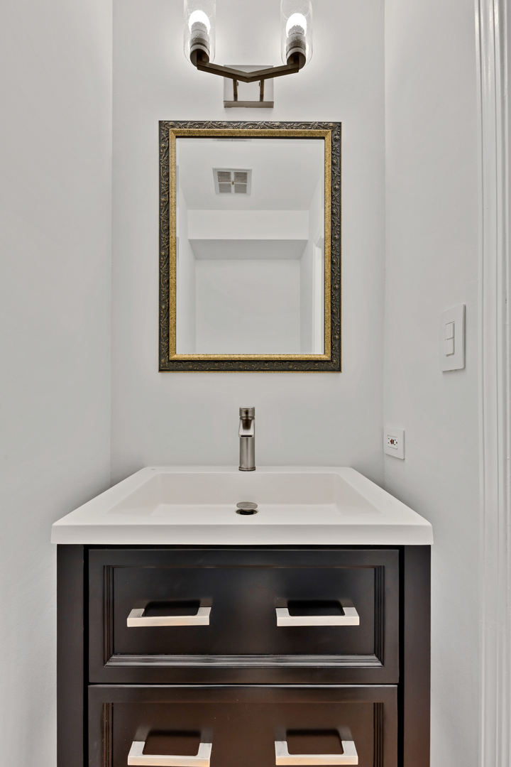 406 Inverrary Lane Deerfield, IL 60015 - Photo 11 of 29 a close view of a sink a stove and microwave