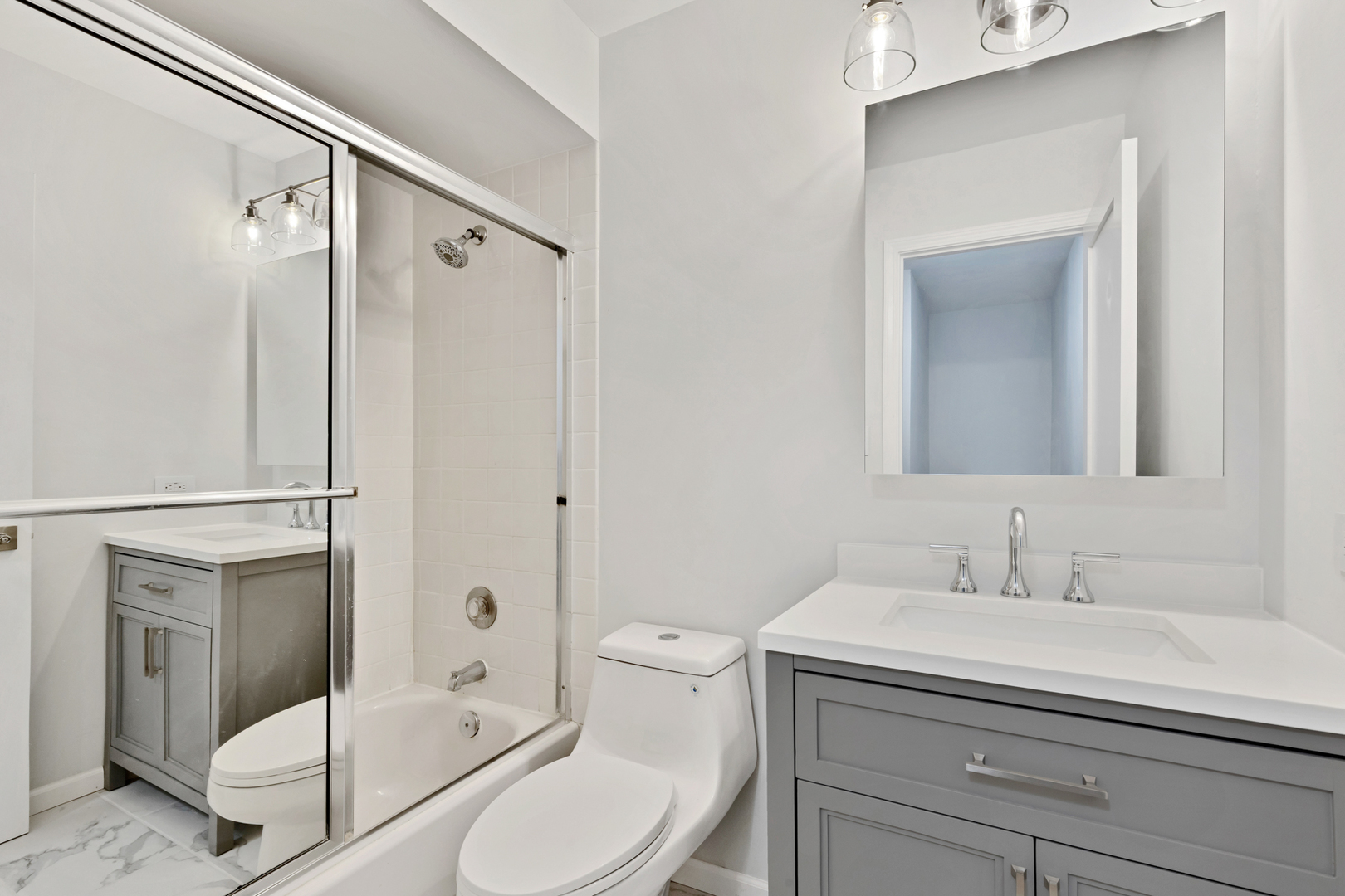 406 Inverrary Lane Deerfield, IL 60015 - Photo 17 of 29 a bathroom with a sink toilet and shower