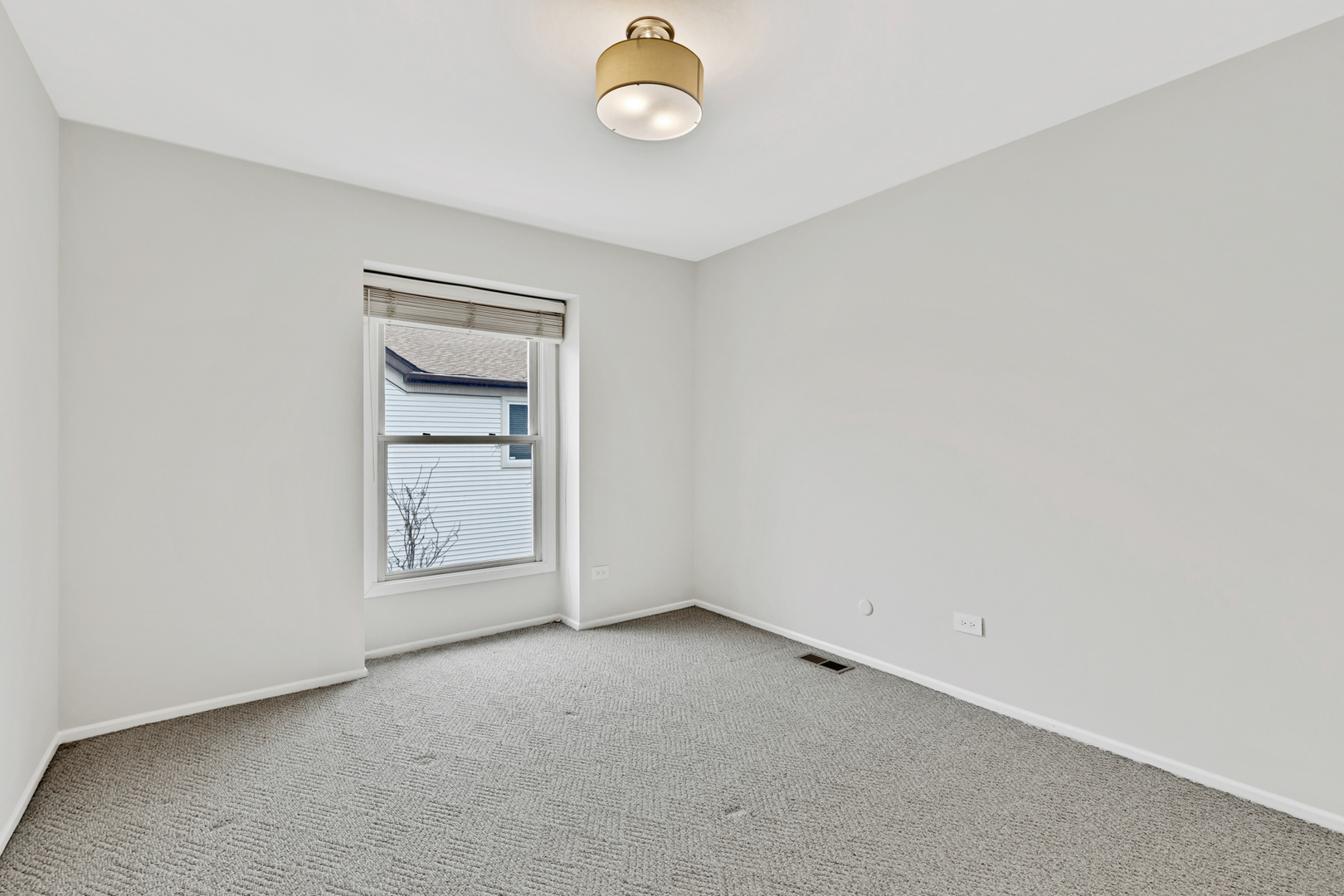 406 Inverrary Lane Deerfield, IL 60015 - Photo 19 of 29 an empty room with a window