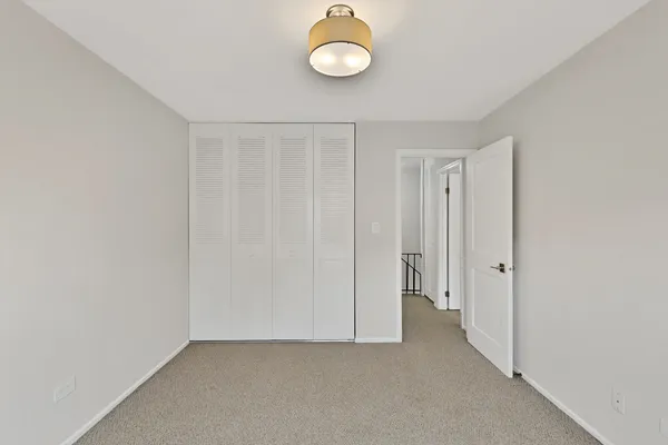 a view of a room with a fan