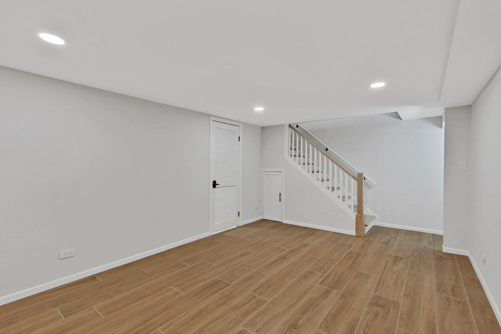 406 Inverrary Lane Deerfield, IL 60015 - Photo 23 of 29 a view of an empty room with wooden floor
