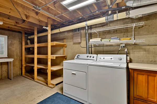 a utility room with dryer and washer