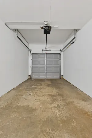 a view of room with a ceiling fan