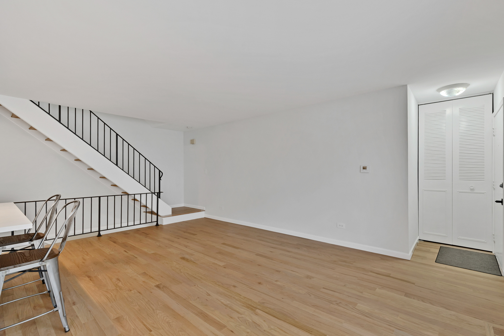 406 Inverrary Lane Deerfield, IL 60015 - Photo 10 of 29 a view of a hallway with wooden floor