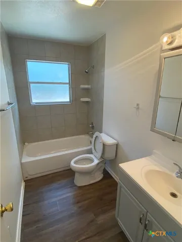 a bathroom with a sink and a bathtub