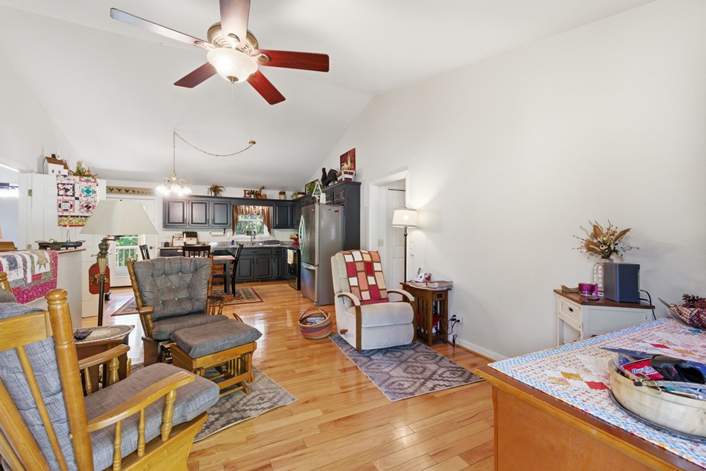 68 West Vineyard Road Hayesville, NC 28904 - Photo 22 of 46 a work room with furniture and wooden floor