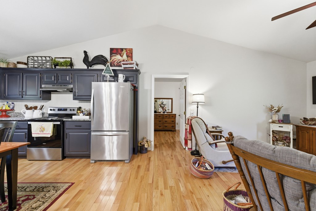 68 West Vineyard Road Hayesville, NC 28904 - Photo 27 of 46 a kitchen with stainless steel appliances granite countertop a refrigerator a stove a sink and dishwasher