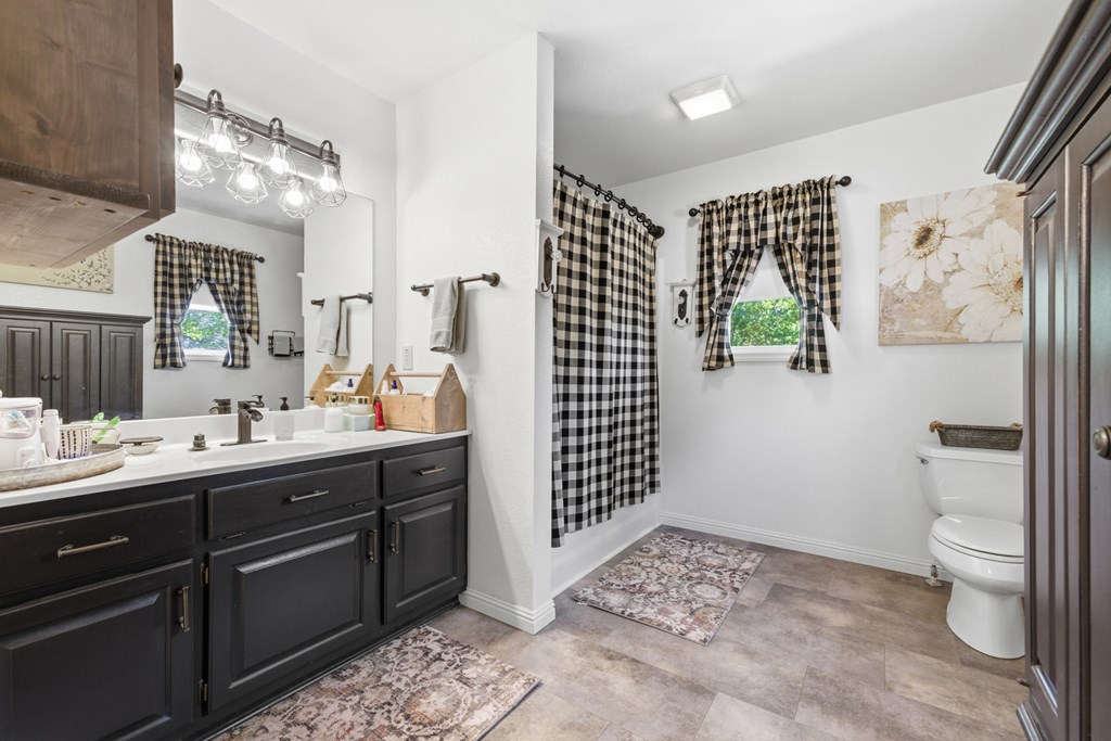 68 West Vineyard Road Hayesville, NC 28904 - Photo 32 of 46 a bathroom with a sink toilet and shower