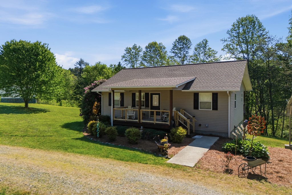 68 West Vineyard Road Hayesville, NC 28904 - Photo 4 of 46 a view of house with a yard