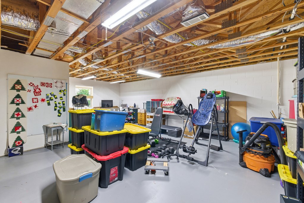 68 West Vineyard Road Hayesville, NC 28904 - Photo 43 of 46 a view of a room with gym equipment