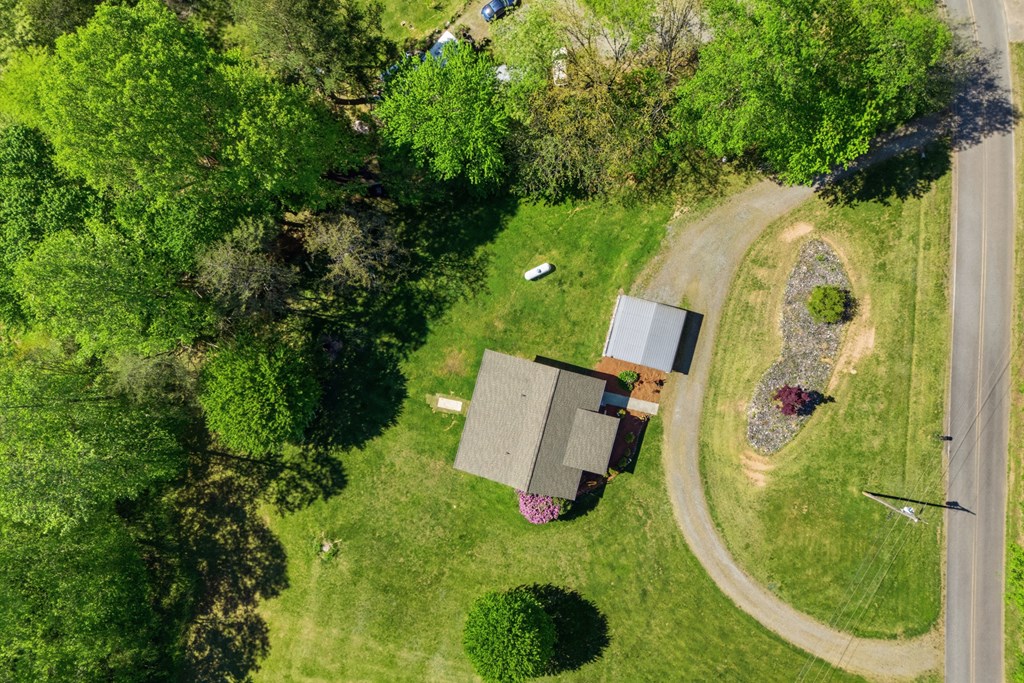 68 West Vineyard Road Hayesville, NC 28904 - Photo 8 of 46 an aerial view of a house with swimming pool and trees