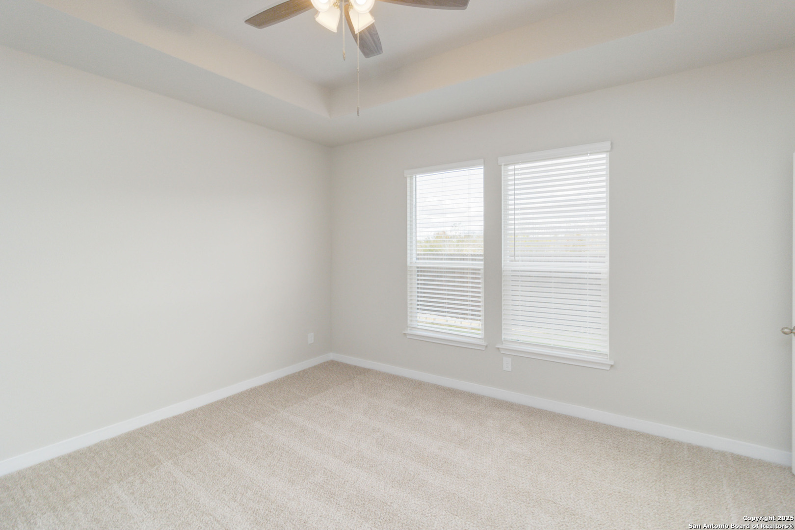 415 Cross Barn Boulevard, Unit B Buda, TX 78610 - Photo 15 of 23 an empty room with a window