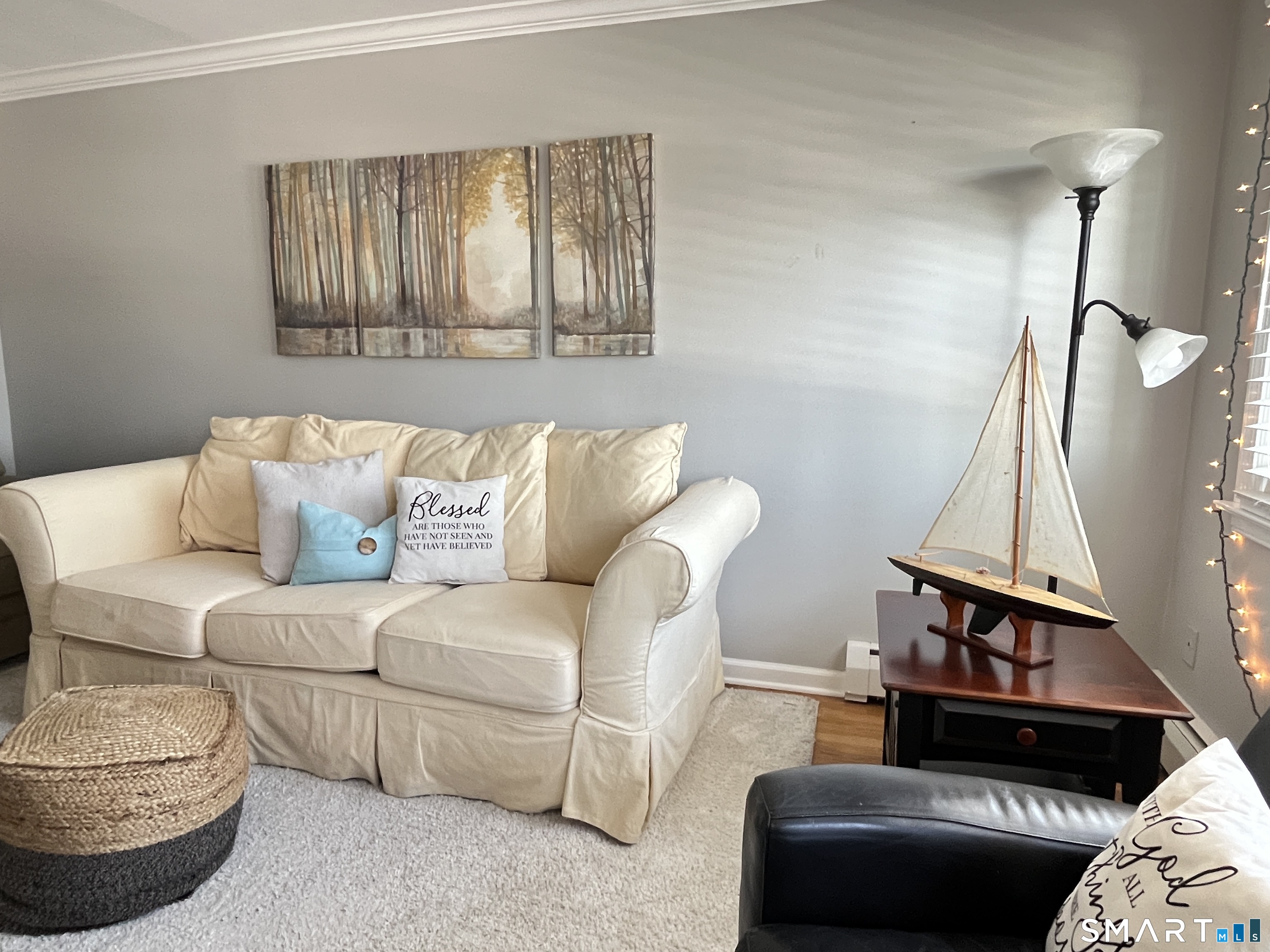 25 Riverside Drive, Unit E4 Clinton, CT 06413 - Photo 3 of 14 a living room with furniture and a window